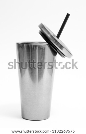 Large Steel mug for keeping temperature for cold drinks; iced coffee and cold water. Steel mug isolated on white background. clipping path object