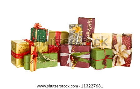 Group of christmas presents nicely decorated with bows and feathers Royalty-Free Stock Photo #113227681