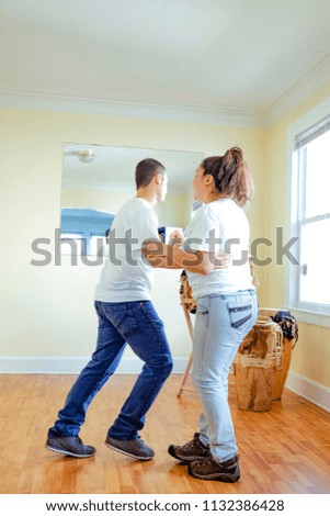 attractive  latin couple dancing in their place