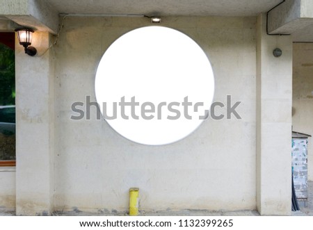 Round blank  banner on a wall with lighting,  place for text