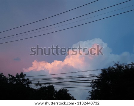 Beautiful nature of sky with some shaped clouds at night sky in the winter of Thailand. 