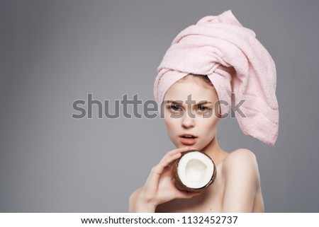  woman in bath towel coconut                              