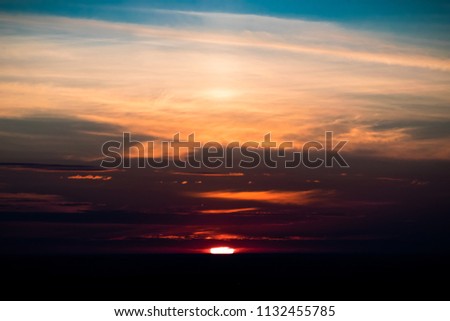 sunset / sunrise with dark ground