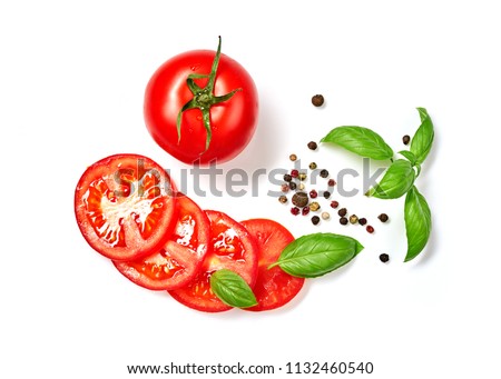 Ripe red tomatoes with basil, rosemary and pepper isolated on white background. Top view. Royalty-Free Stock Photo #1132460540