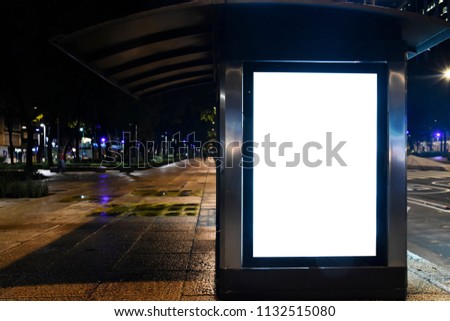 Blank white mockup in kiosk at night