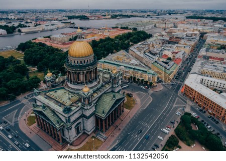 Cityscape of St. Isaac`s Cathedral and Aleksandrovskiy Garden in Saint Petersburg, Russia. View from above of beautiful city. Famous city`s sight