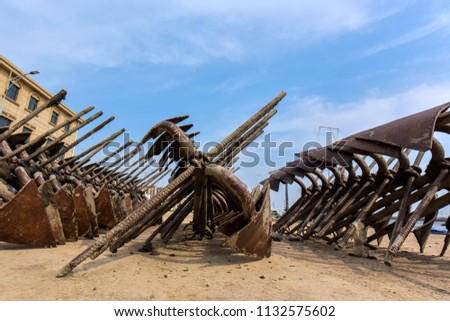 Iron anchors in a fishing port