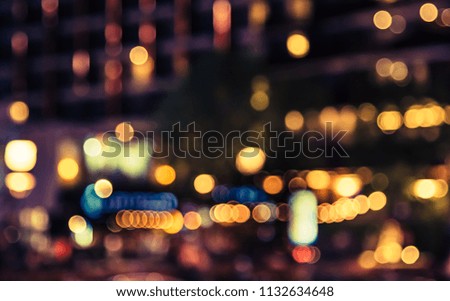 Abstract blur image of  Night light bokeh for background usage . (vintage tone)