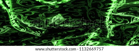  pattern of silk fabric Royal monogram. green. Luminous velvet represents a shining gold floral damask pattern that grows everywhere. This velvet can also be used for a number of fashion applications!