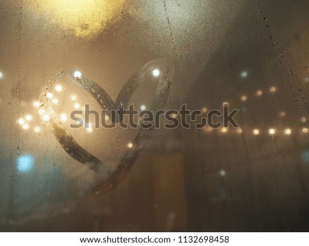 Heart shape and bokeh lights background