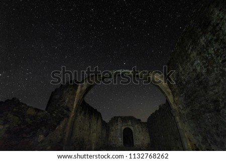 Night photography from the ruins of an ancient hermitage located near Guijo de Granadilla. Ermita de Hojaranzo. Extremadura, Spain.