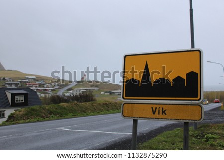 Yellow City Welcome Sign in Vik Iceland - Foggy Grim Haunting Town - Top Icelandic Sights