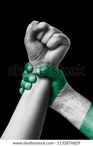 Fist painted in colors of nigeria flag, fist flag, country of nigeria