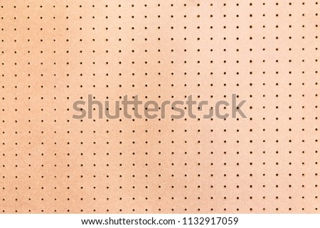 pegboard background texture. Royalty-Free Stock Photo #1132917059