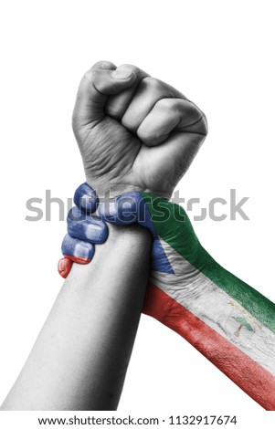 Fist painted in colors of Equatorial guinea flag, fist flag, country of Equatorial guinea 