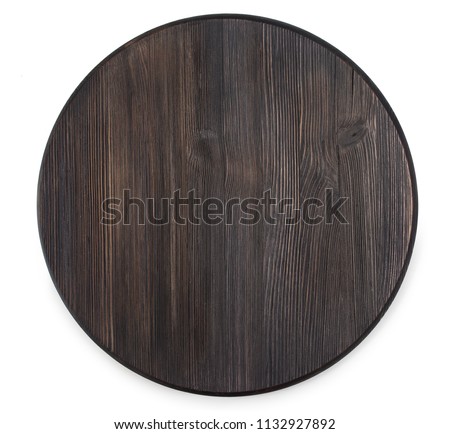 Vintage old textured wooden round cutting board isolated on a white background, top view. Royalty-Free Stock Photo #1132927892