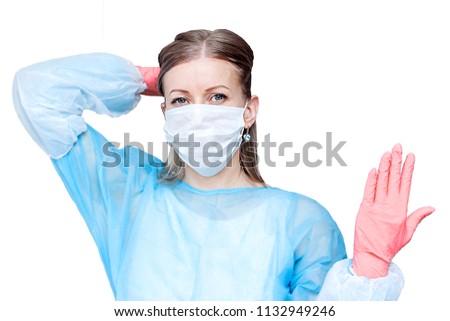 Female doctor in medical mask and pink gloves looking at camera. isolated on white. Healthy, vitamins, vaccination, medical store, pharmacy, recovery, proper nutrition concept