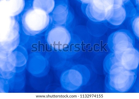 Blurred blue bokeh background texture from natural