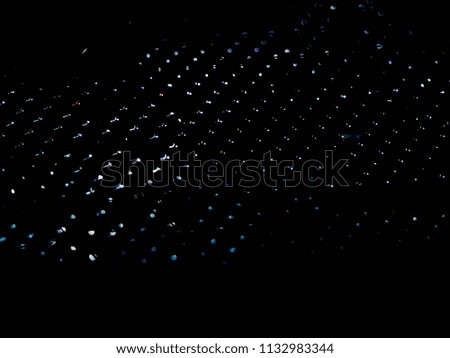 Texture of light in dark background