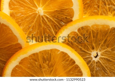 Orange slice and external part close up. Orange pulp and peel. macro image.