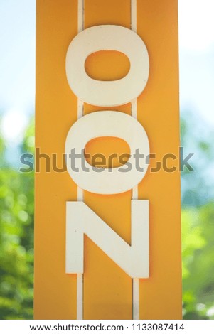 ZOO. Zoo sign made of wood. Multicolored Tree
