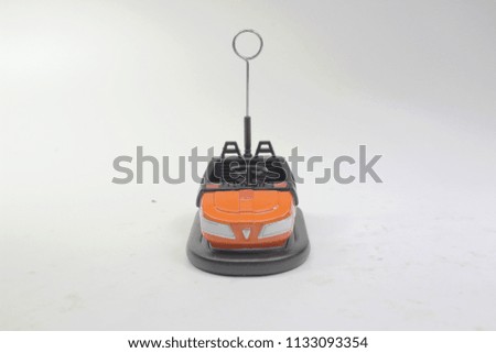 
a mini figure of a Bumper car 
