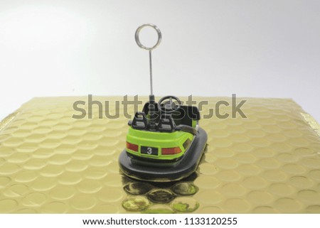 
a mini figure of a Bumper car 

