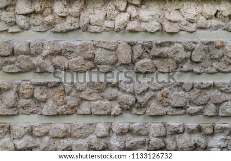 Texture of a stone wall. Background. Decorative wall. Stone wall as a background or texture. Part of the wall, for a background or texture Royalty-Free Stock Photo #1133126732