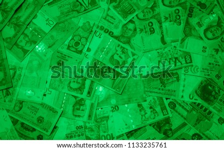 Green colored money of different countries. Coins and banknotes. Currencies