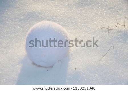 White snow ball.