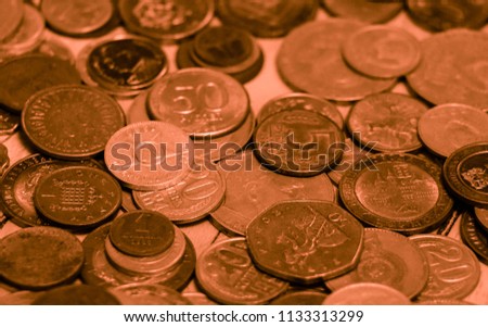 Coffee colored money of different countries. Coins and banknotes. Currencies