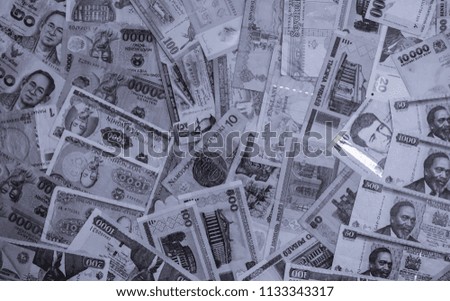 Cold silver colored money of different countries. Coins and banknotes. Currencies