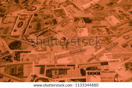 Coffee colored money of different countries. Coins and banknotes. Currencies