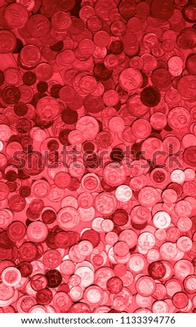 Red bloody colored money of different countries. Coins and banknotes. Currencies