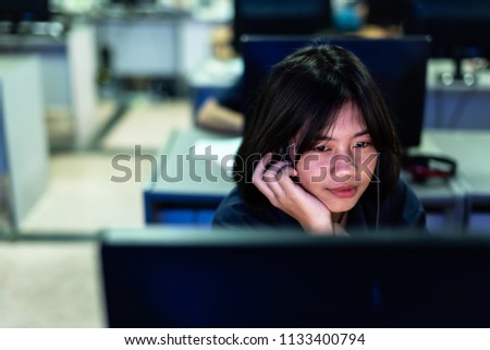 Female high school student is studying in computer room, Thailand , southeast Asia.(Original style image)