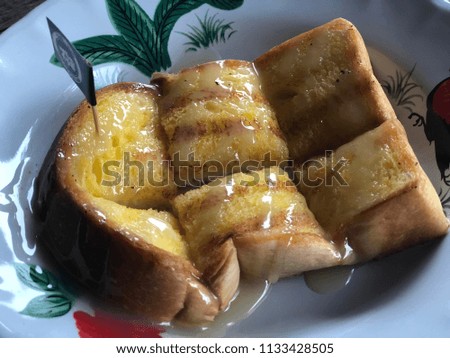 Toast with condensed milk.