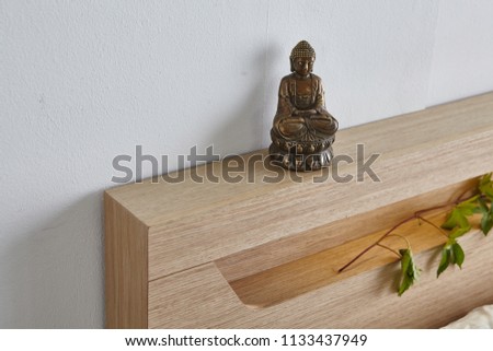 Modern peaceful Bedroom. zen style bedroom. Peaceful and serene bedroom. Wood bed with oriental object.led bed. japanese style bedroom.