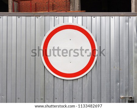 
Traffic sign "Movement prohibited", attached to the corrugated metal.					