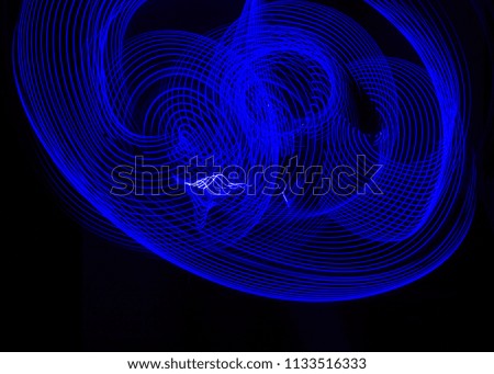 Electric Blue Light Painting Photography, Parallel Lines, Waves And Curves Against A Black Background