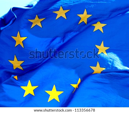 A waving European Union Flag in sunlight