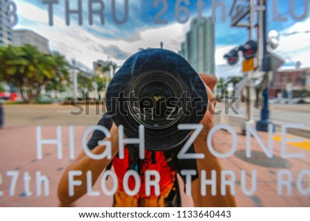 Camera points at utility sign