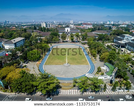 Aerial View of Gasibu Field, after got renovated, with Gedung Sate in the background. Completed with synthetic grass on the running track. An Bandung Icon, West Java, Indonesia, Asia