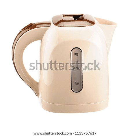 Beige and brown color plastic cordless electrical kettle isolated on the white background
