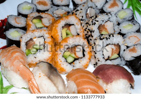 Sushi is a dish of Japanese origin based on rice that is accompanied in general with: sesame, salmon or trout