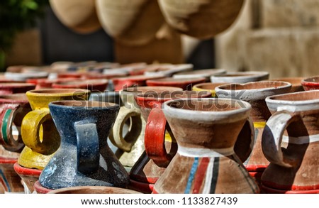 Pots in Nizwa fort, Oman. Sultanate of Oman. 
 Royalty-Free Stock Photo #1133827439