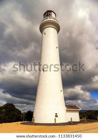 Portrait picture of the Split Point Lighthouse at Aireys Inlet, a famous landmark and tourist destination on the Great Ocean Road in Victoria, Australia