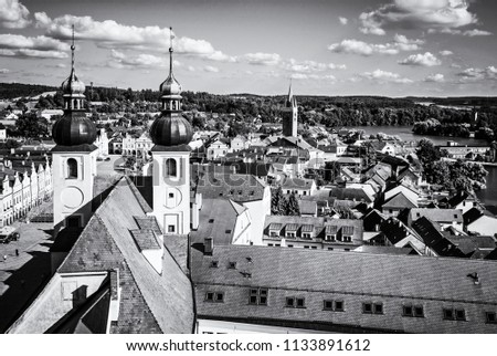 Telc town with Church of the holy name of Jesus, Czech republic. Architectural scene. Unesco World Heritage Site. Travel destination. Black and white photo.