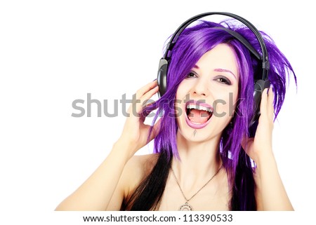 Portrait of a punk girl in headphones. Isolated over white background.