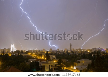 City under lightning