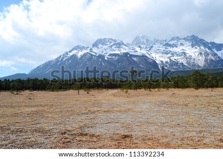 snow mountain with forest in ShangriLa, Shangri La Yunnan province